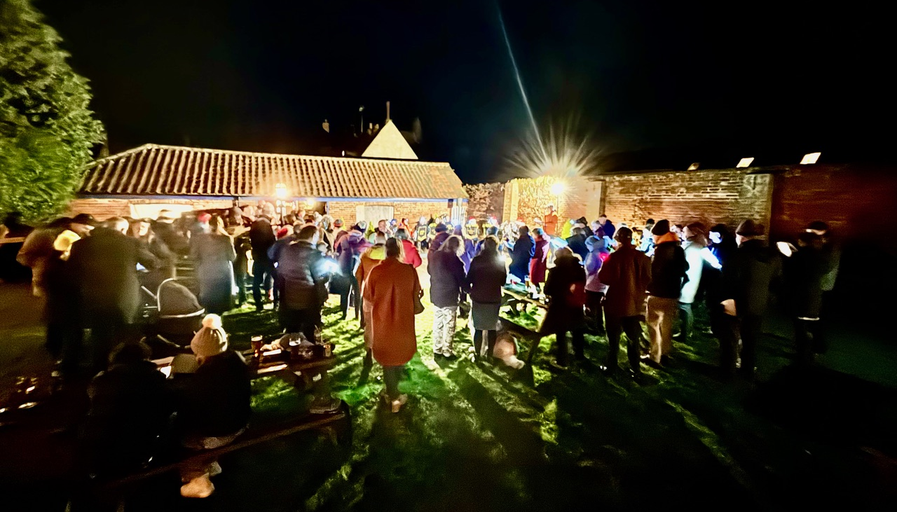 Beer and Carols in The Bell gardens